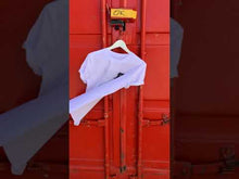 Load and play video in Gallery viewer, SHE'S HERE, CECILIA EDEFALK, T-SHIRT