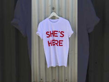 Load and play video in Gallery viewer, SHE&#39;S HERE, T-SHIRT
